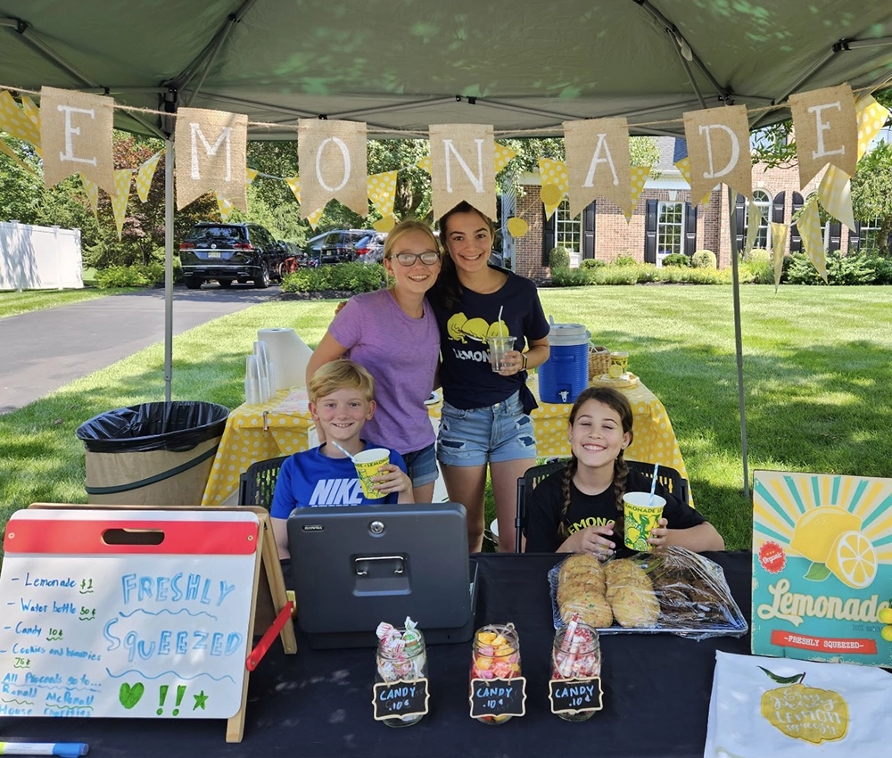 kids hosting a lemonade stand fund raiser